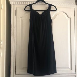Sleeveless shift dress perfect for summer. Can wear as a dress or beach cover up